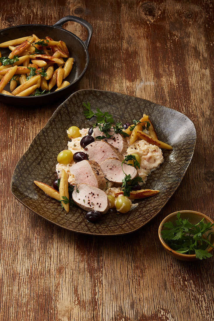 Pork fillet with braised cabbage and grapes