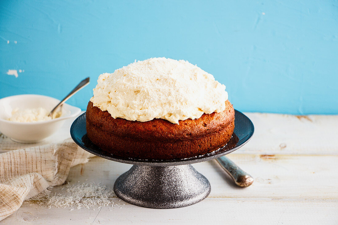 Homemade three milk cake with coconut and mascarpone cream