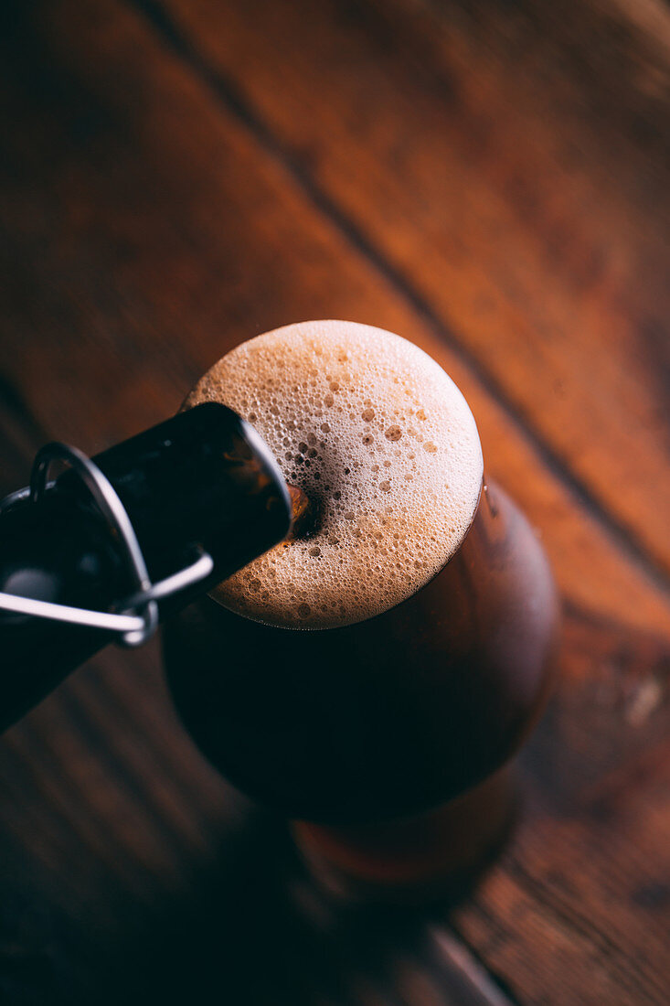 Dark beer being poured