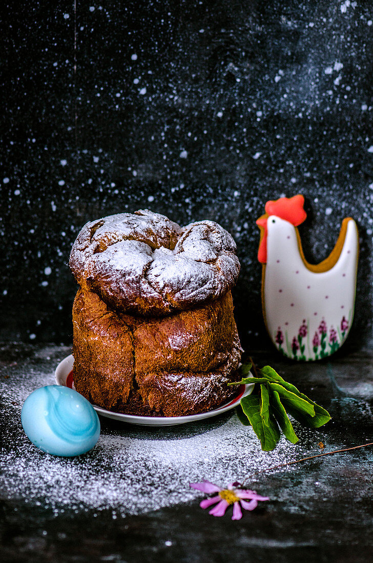 Easter cake, blue egg and gingerbread chicken