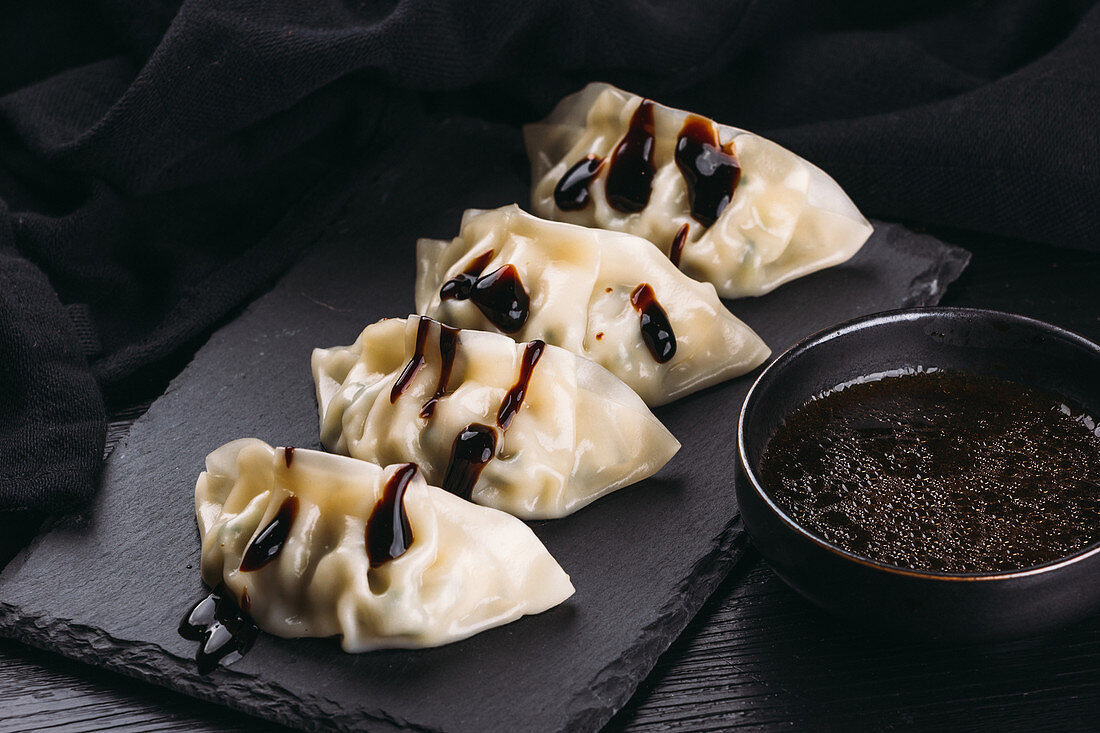 Gyozas with soy sauce (Japan)