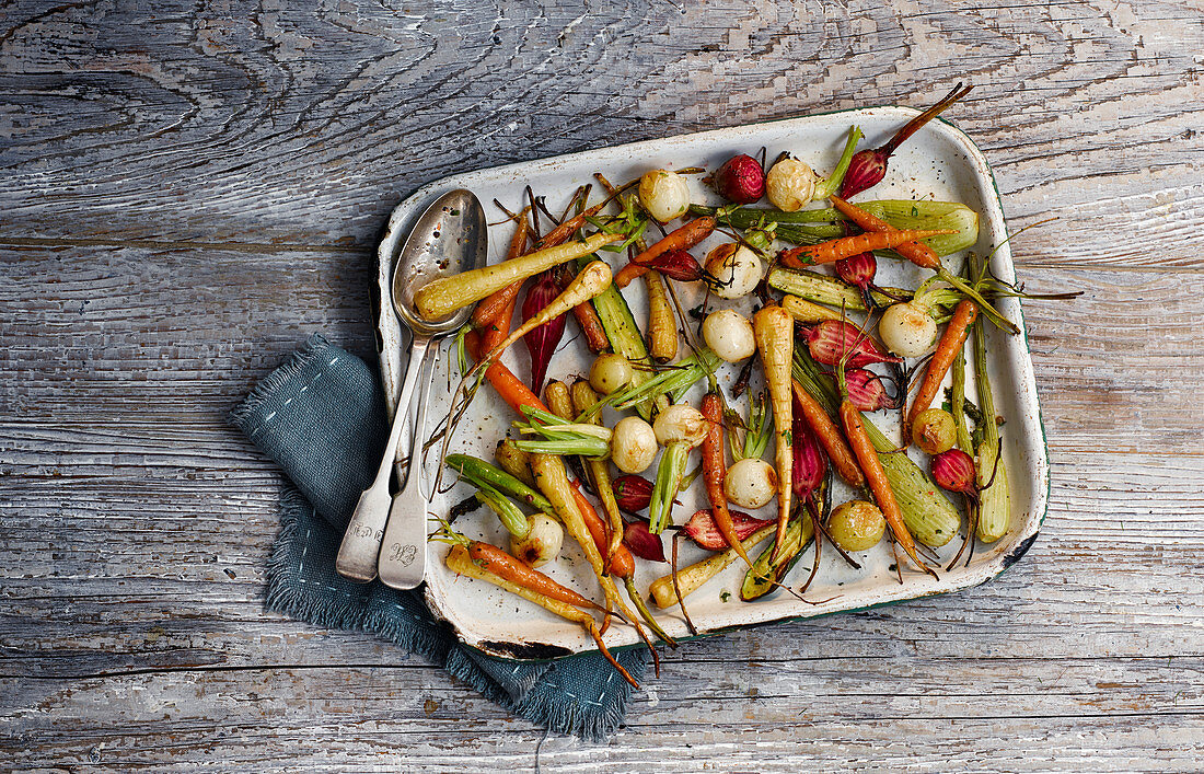 Roasted root vegetables on an old baking sheet