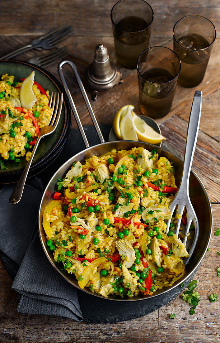 Vegetable paella with artichokes