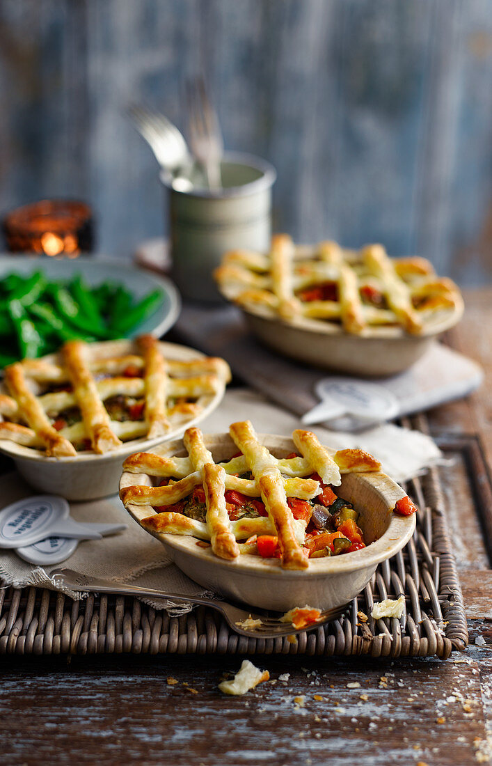 Vegetable pies with pastry lattices