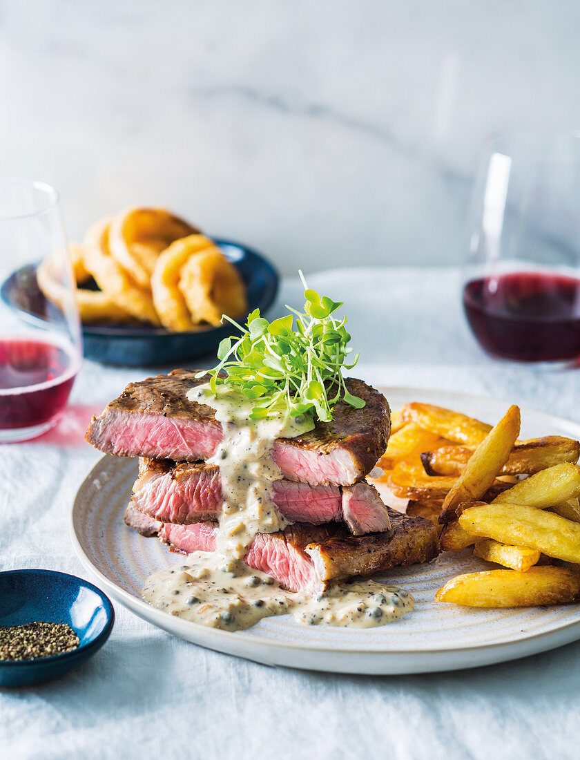 Rump steak with Madagascan peppercorn sauce and duck fat chips
