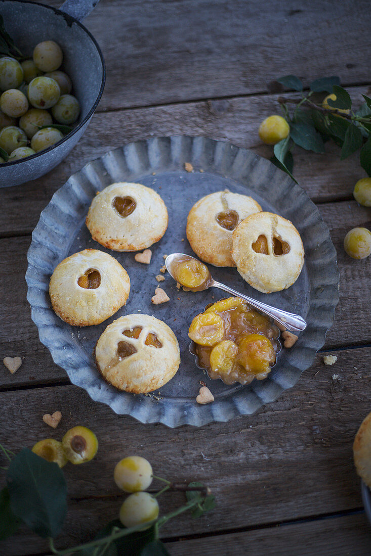 Hand pies (mini pastries) filled with mirabelle plums