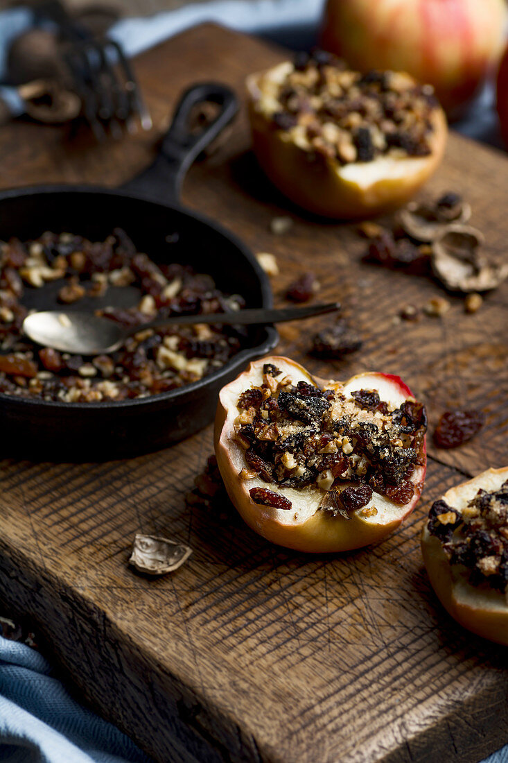 Baked apples with walnuts, raisins and dried plums
