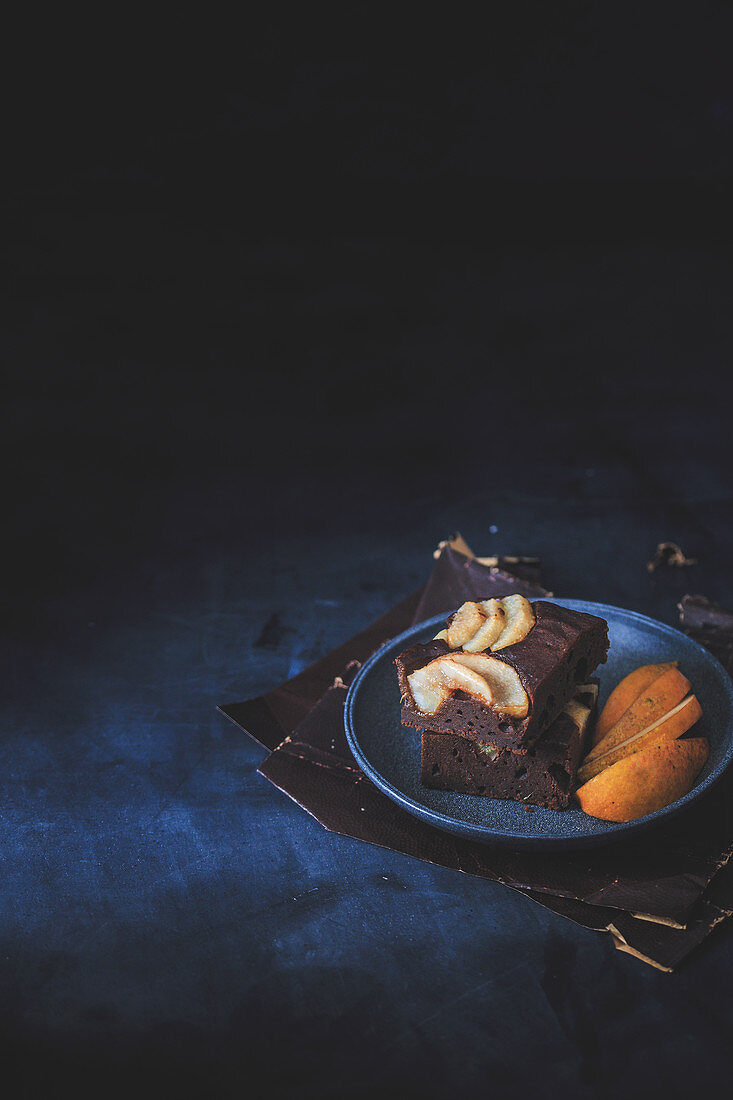 Pear brownie on a dark surface