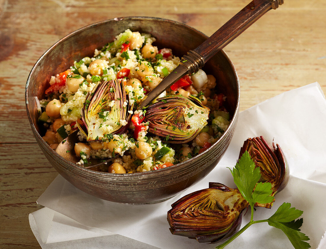 Couscous and chickpea salad with fried mini artichokes