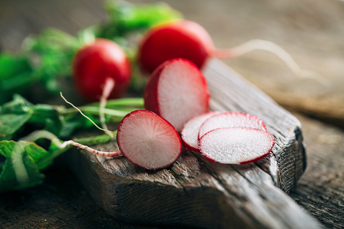 Fresh radish on wooden background