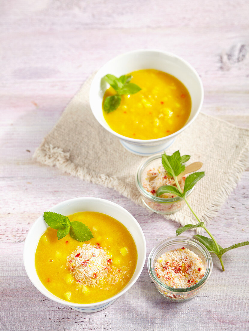 Yellow lentil and pineapple soup with curry, ginger, chili and coconut