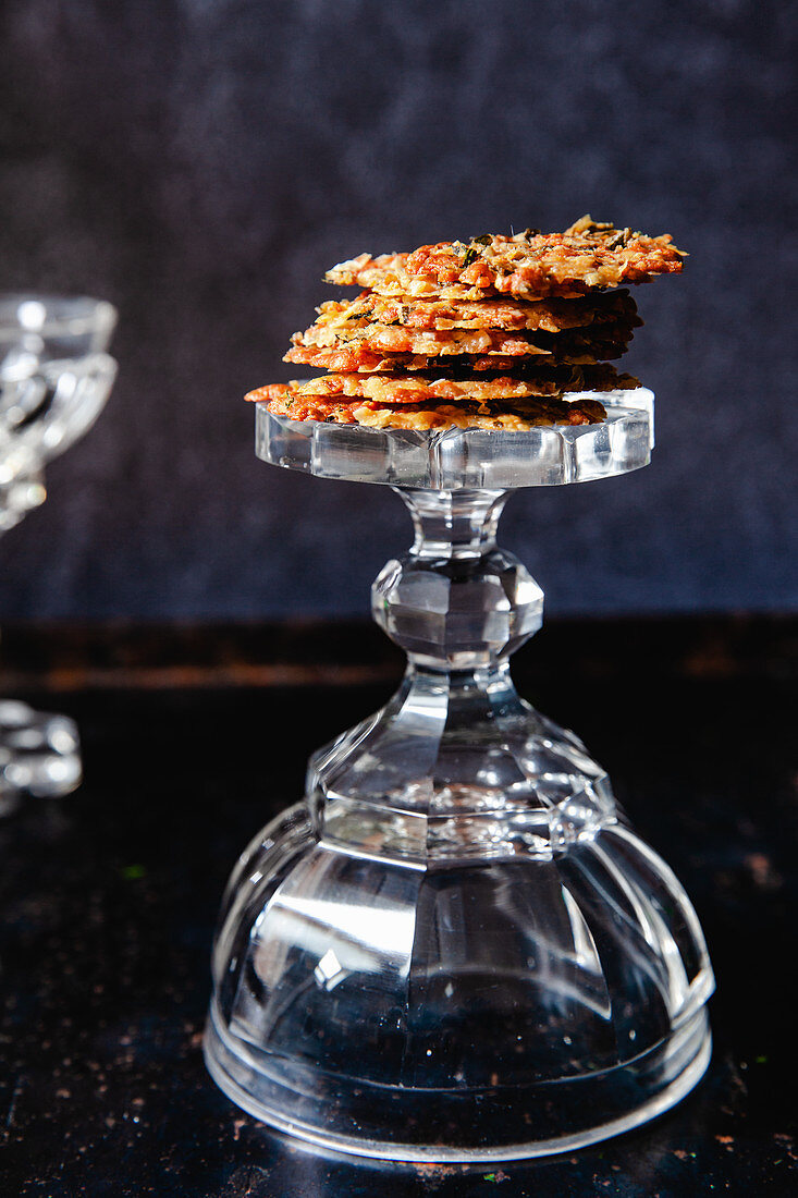 Savory cheese crackers on a glass