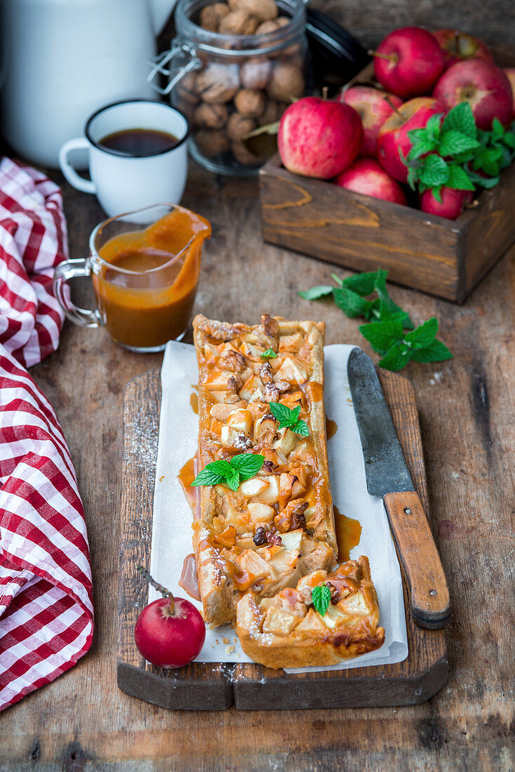 Apple caramel pie with walnuts