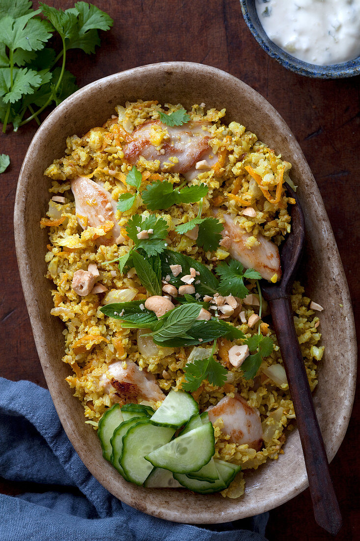 Curried chicken with cauliflower rice and peanuts