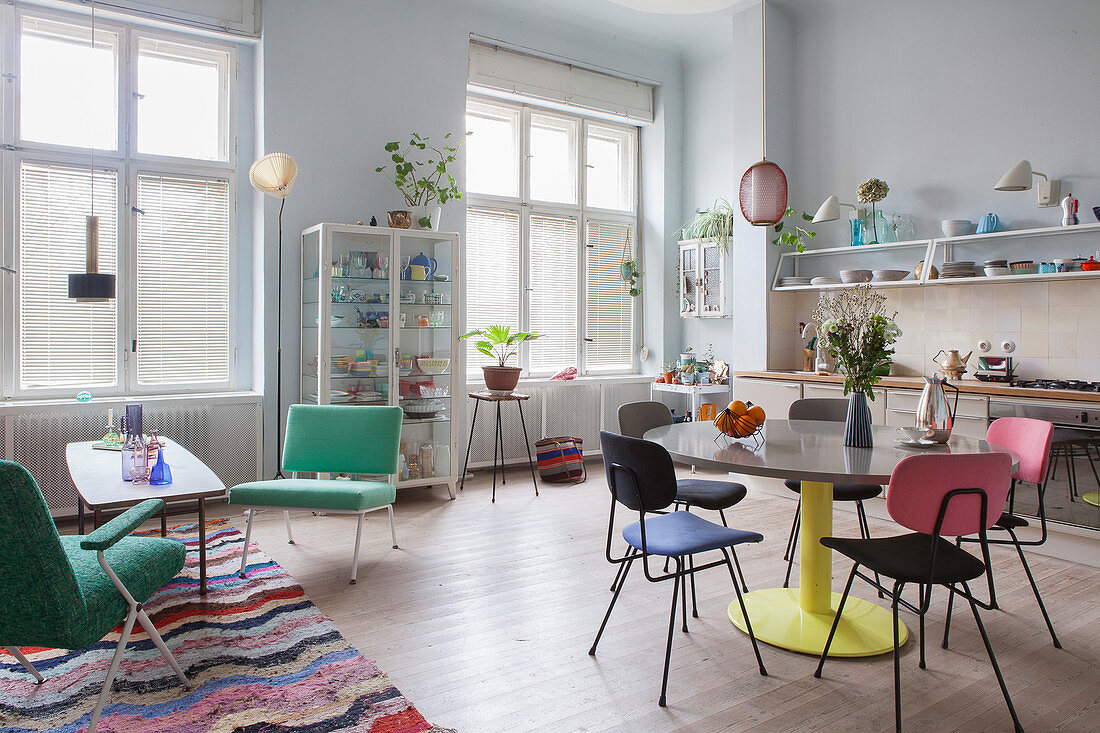 Colourful retro furniture in open-plan period interior