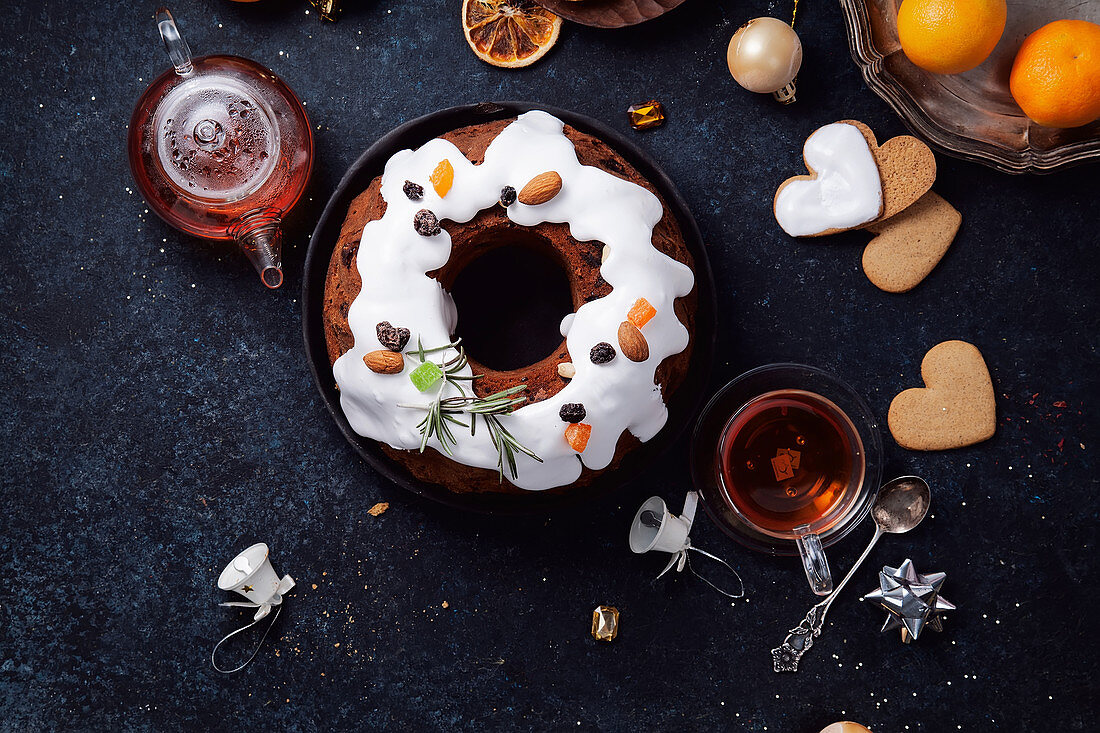 Christmas cake with dried fruits soaked in rum and sugar glaze