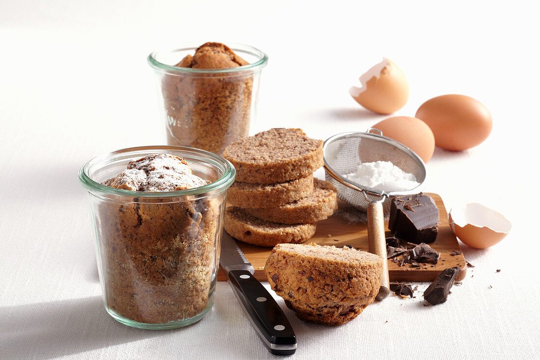 Mini chocolate cakes baked in jars with ingredients