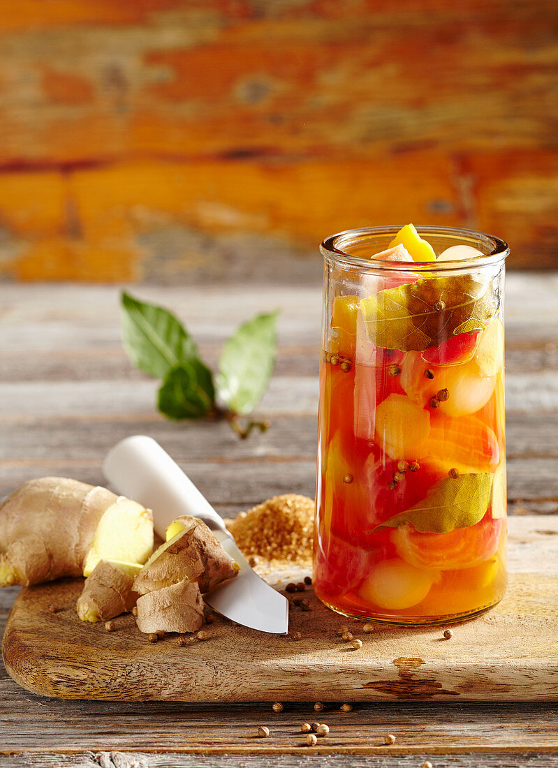 Colourful pickled beets with ginger, pearl onions, coriander seeds and fruit vinegar