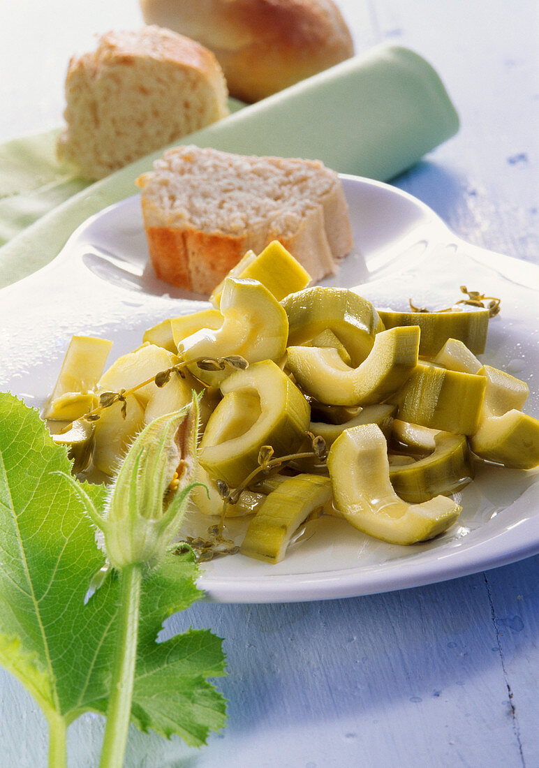 Pickled sweet and sour courgette with white wine vinegar, sugar and thyme