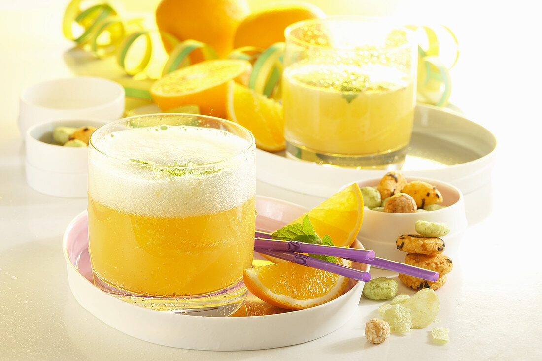Orange punch with white rum, champagne and pineapple juice