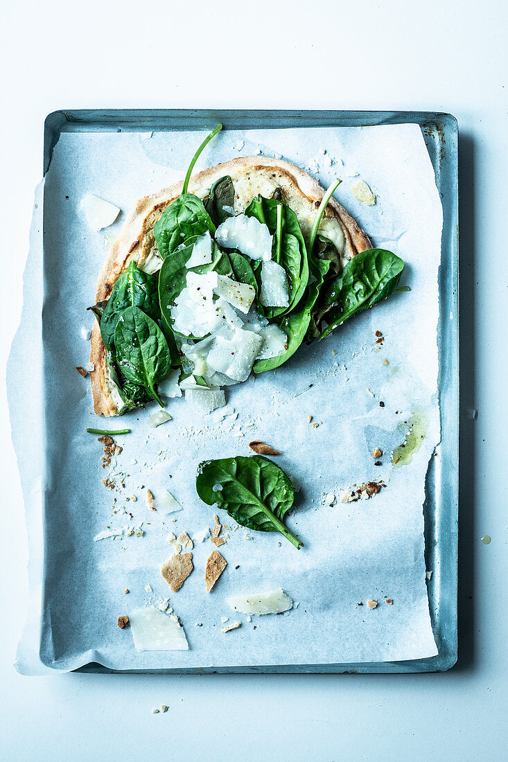 Tarte flambée with spinach and Parmesan