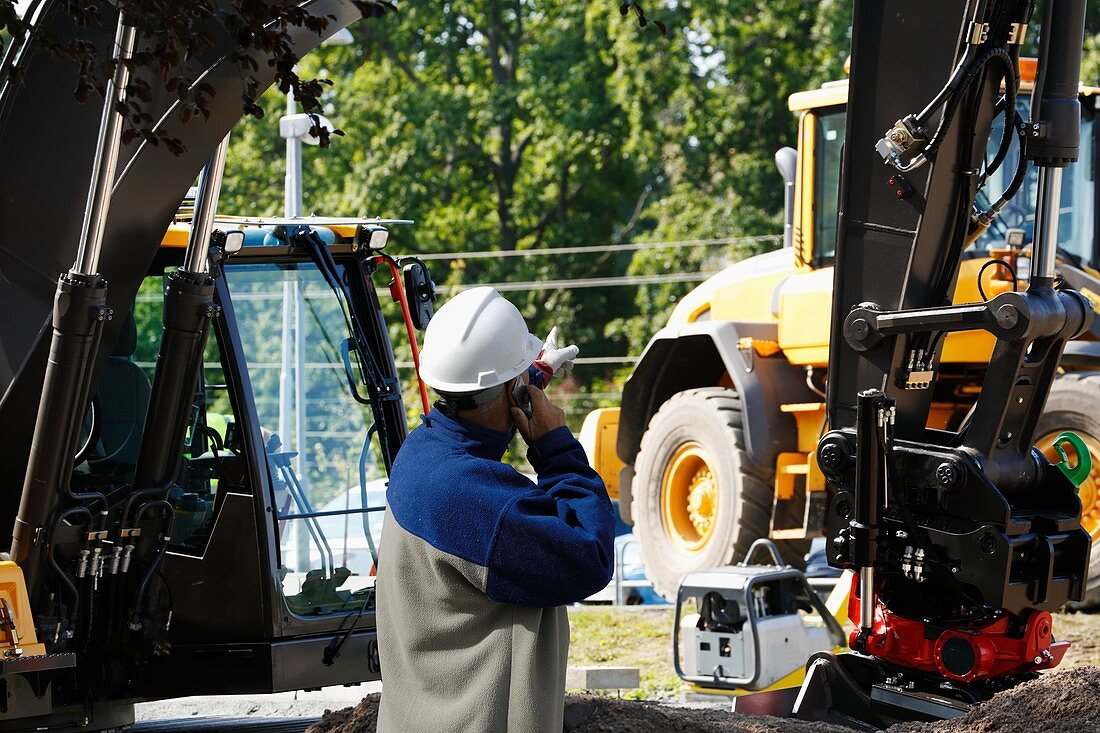 Engineer on phone on construction site