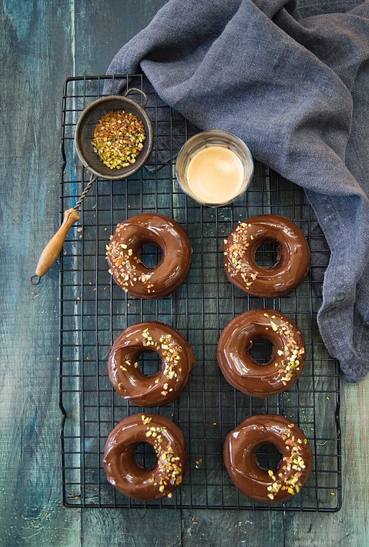 Donuts with a chocolate glaze and chopped nuts