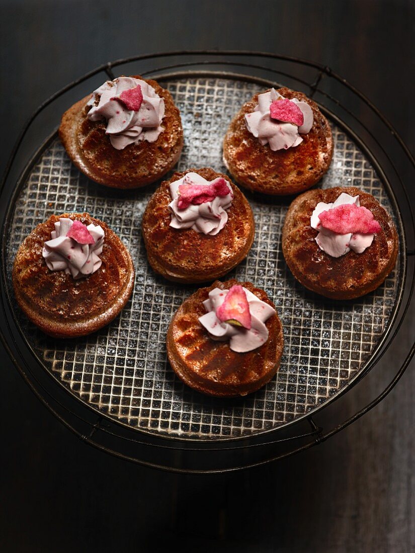 Mini gugelhupfs with raspberry cream and candied rose petals