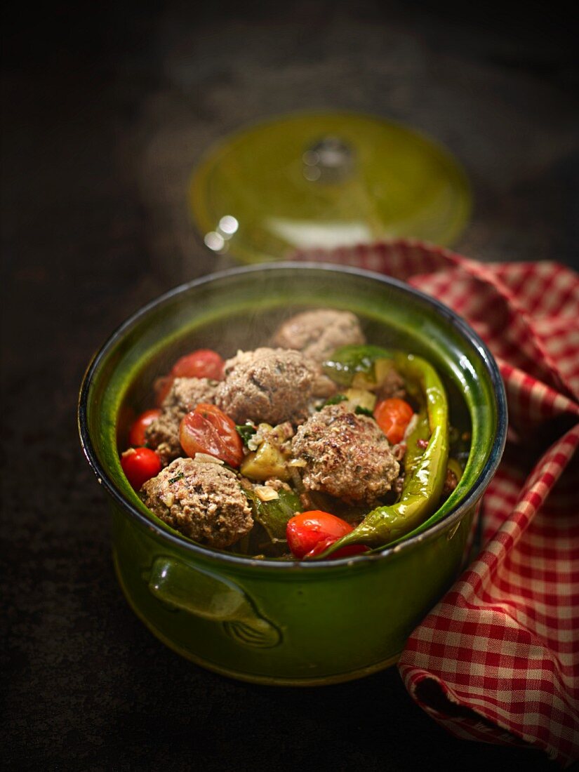 Meatballs with courgettes, tomatoes, herbs and shallots