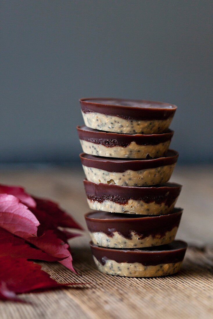 Stack of healthy raw cashew butter chocolate cups