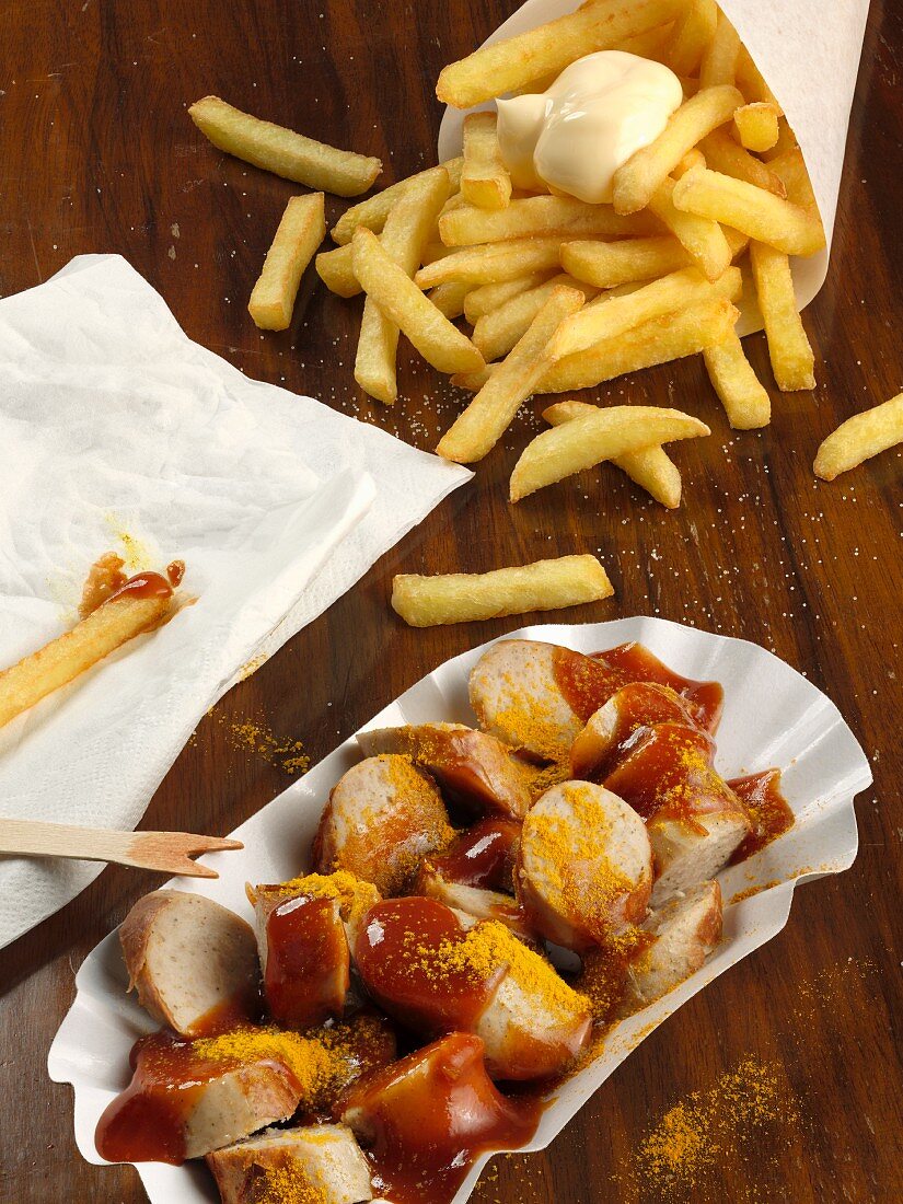 Currywurst and fries with mayonnaise