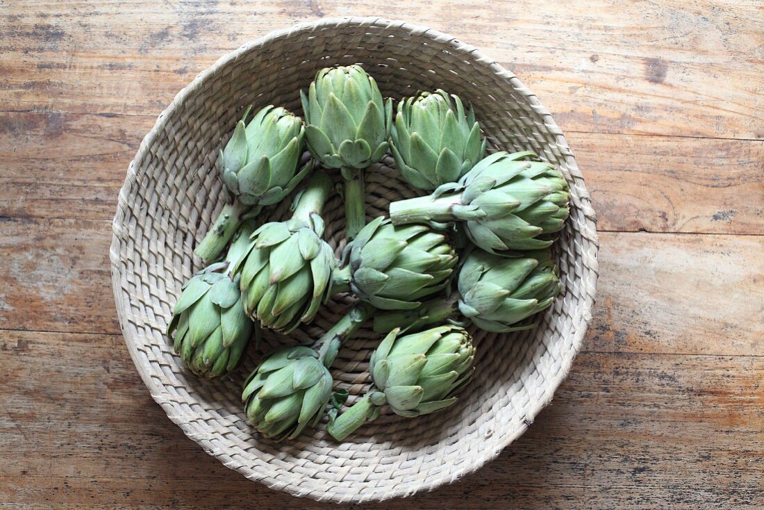 Fresh green artichokes in a basket