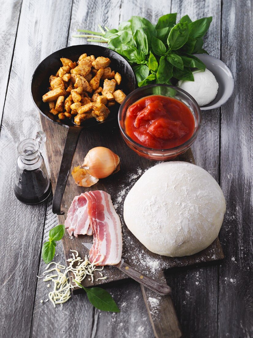 Ingredients for a pizza cake with fried chicken breast