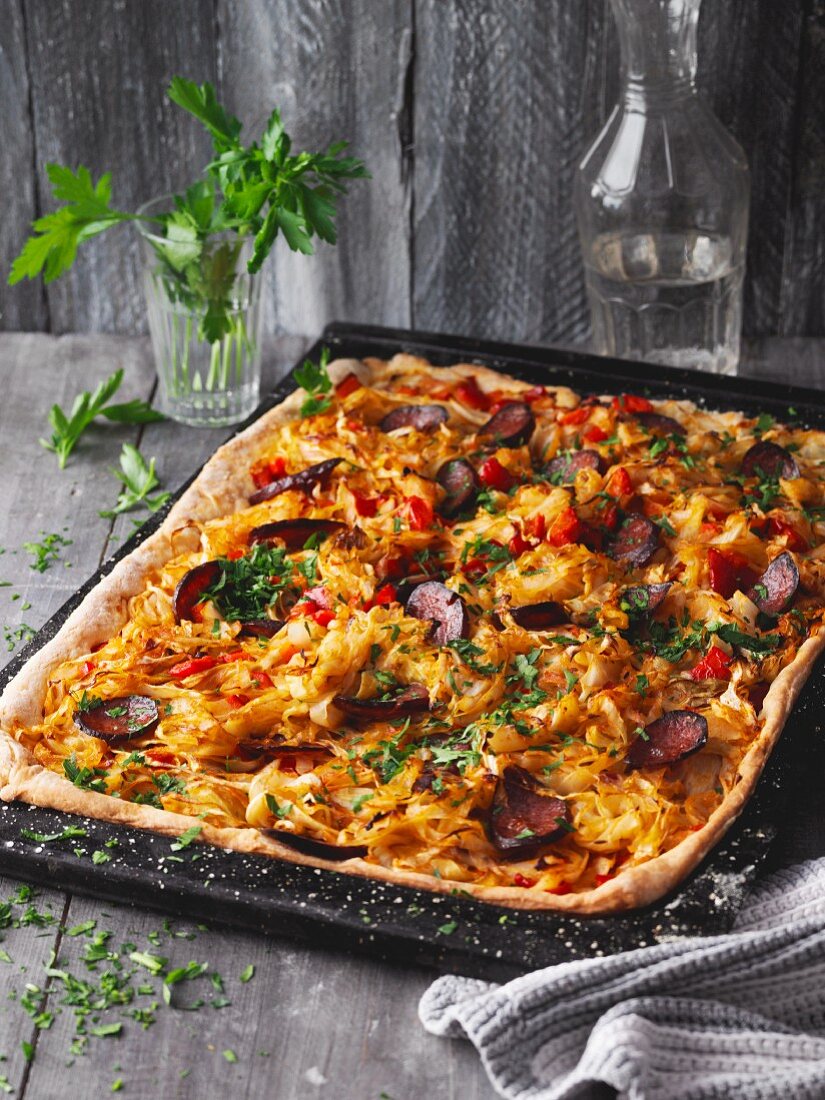 Pointed cabbage tray-baked pizza with cabanossi sausage