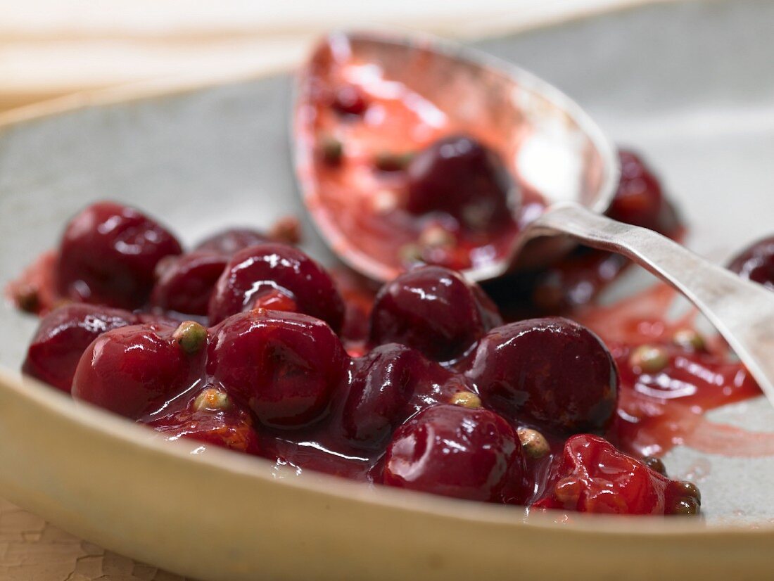 Cherries with peppercorns and orange juice