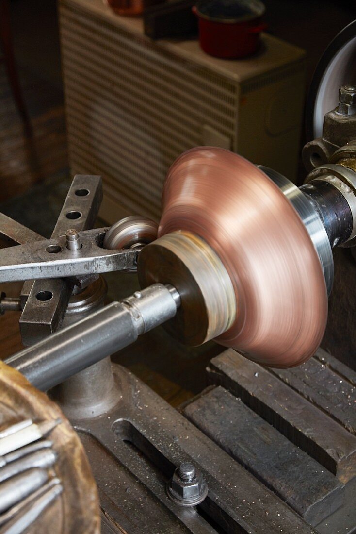 Copper sheet being formed at the Kupfermanufaktur Weyersberg copper factory in Baden-Württemberg, Germany