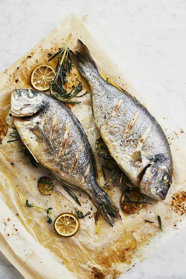 Oven-baked sea bream with lime and herbs