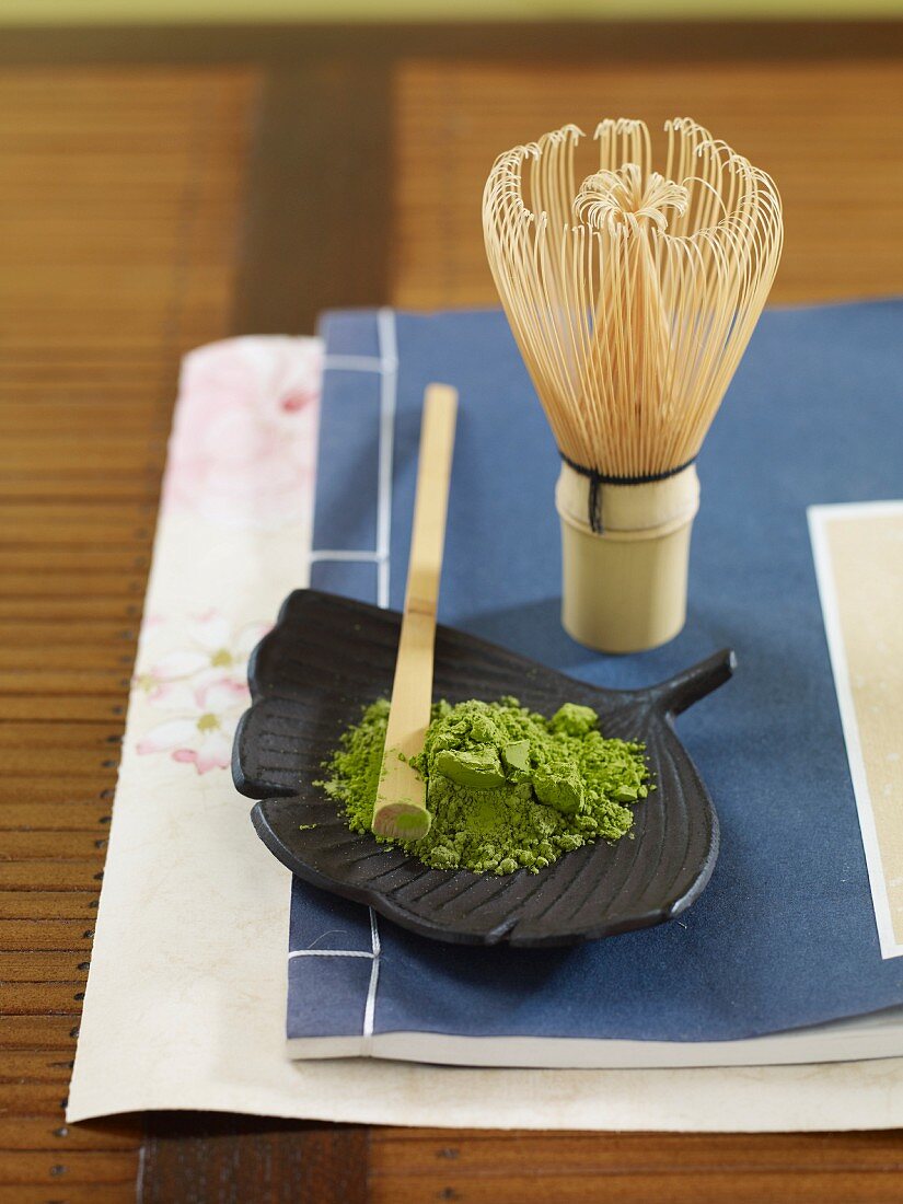Matcha powder and a tea whisk (Japan)