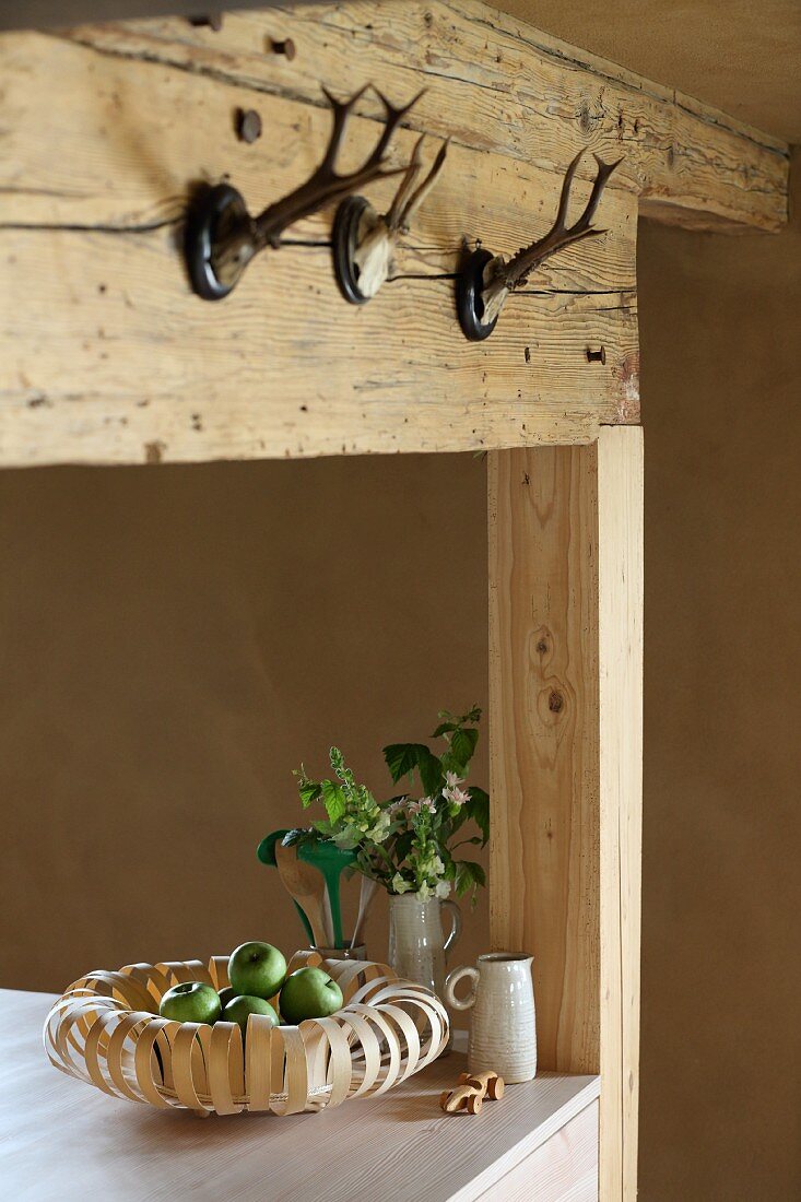 Fruit bowl made from wood veneer in rustic country-house kitchen