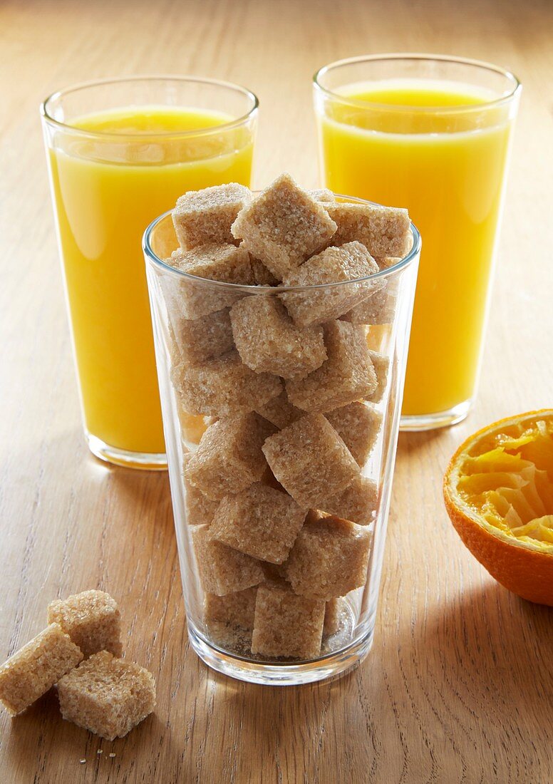 Freshly squeezed orange juice and sugar cubes