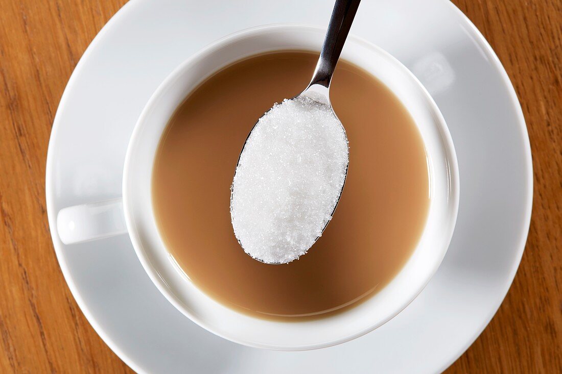 Cup of tea with spoonful of sugar