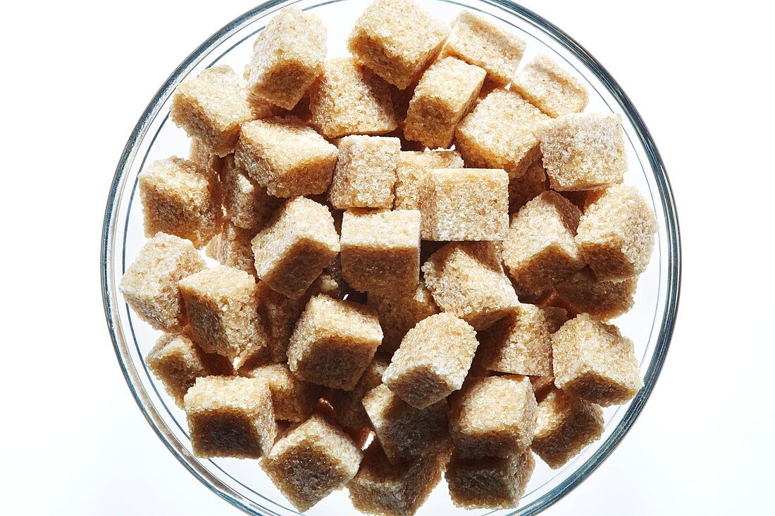 Brown sugar cubes in bowl