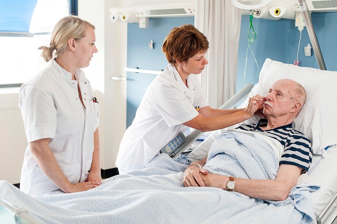 Patient with nurses