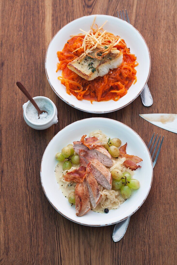 Red sauerkraut with fried fish and sauerkraut with pheasant breast, bacon and grapes
