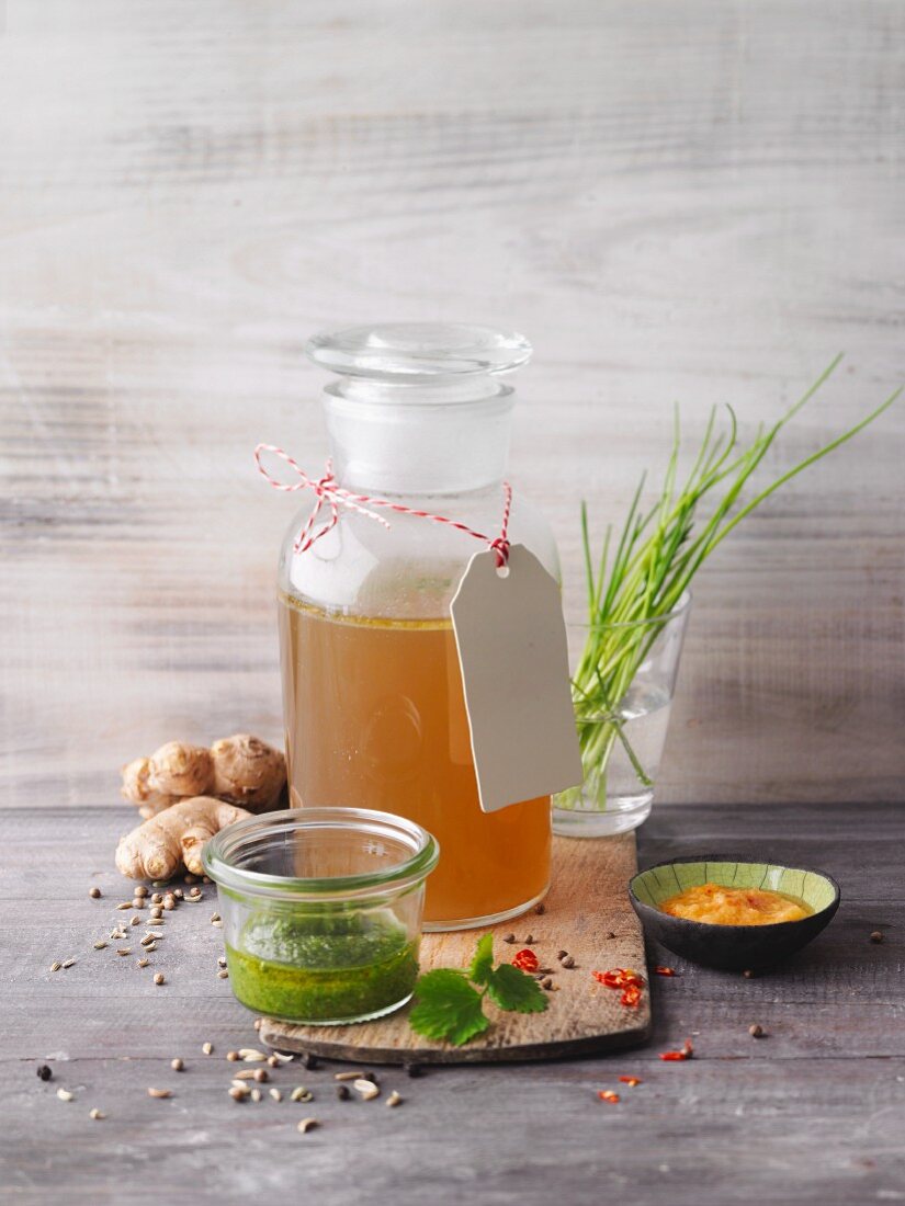Vegetable stock in a glass apothecary bottle