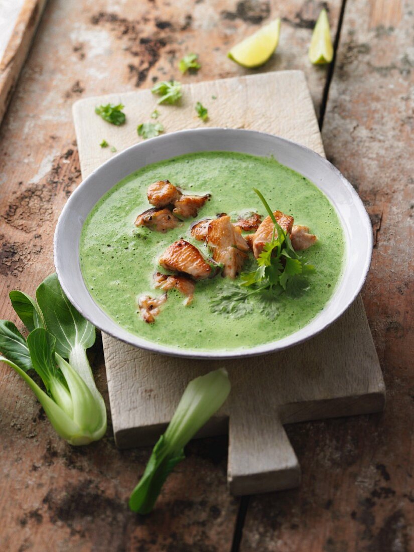 Green coconut soup with fried chicken