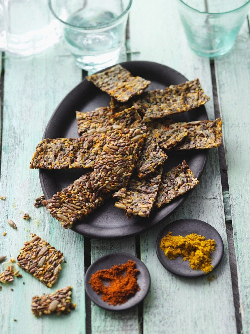 Sesame and chia crackers with chilli and curry powder