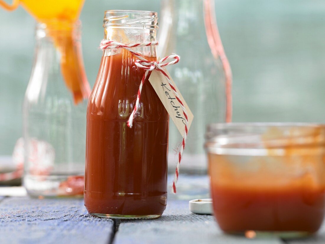 Homemade ketchup in a glass bottle