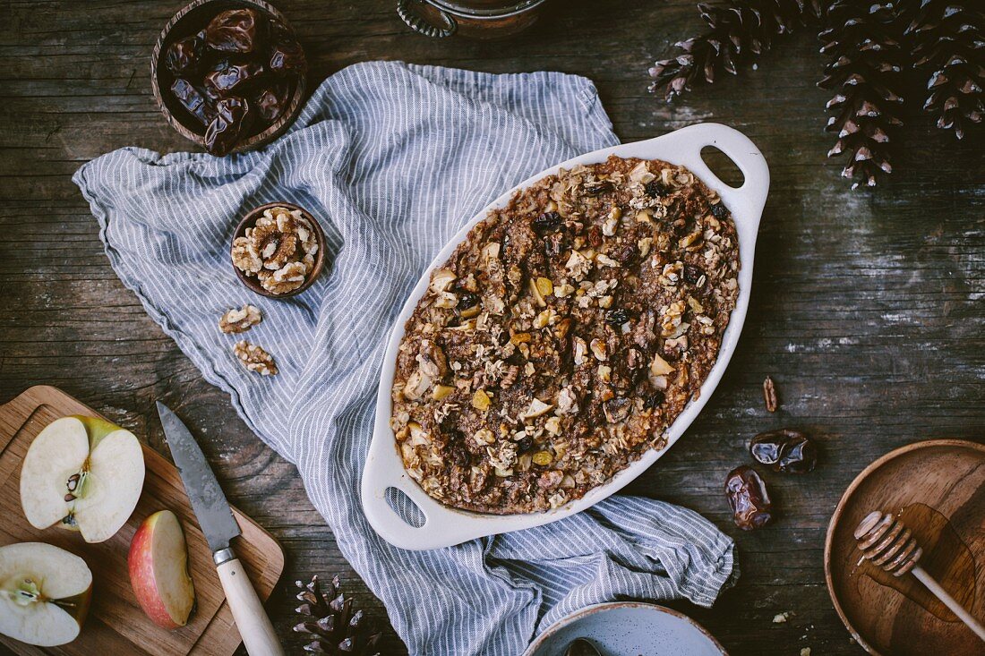 Baked oatmeal with apples, dates, bananas, and walnut is just out of the oven