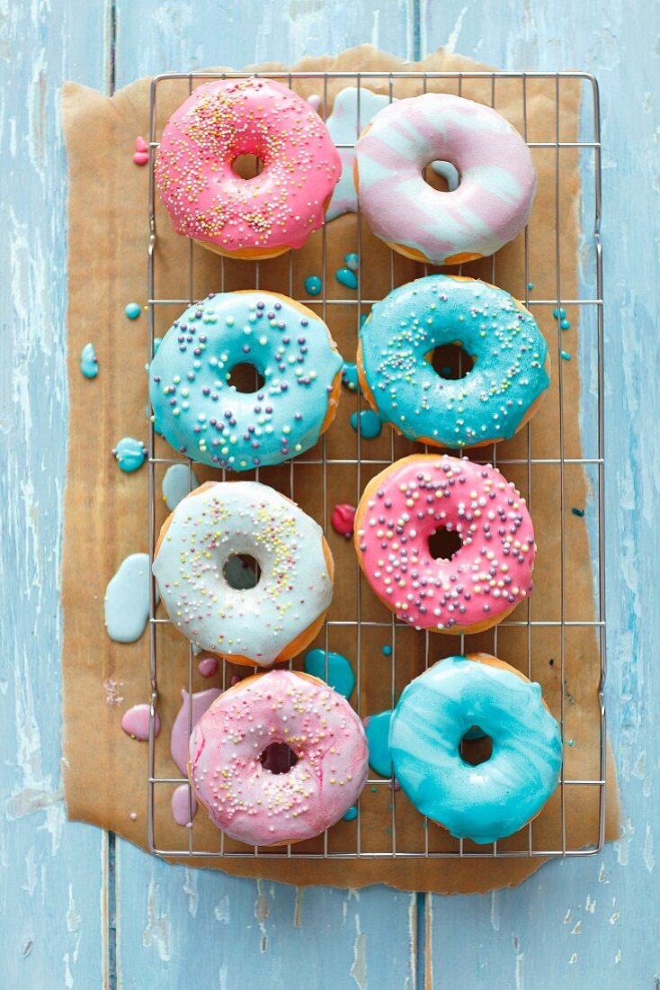 Doughnuts with a colorful sugar glaze and sugar balls
